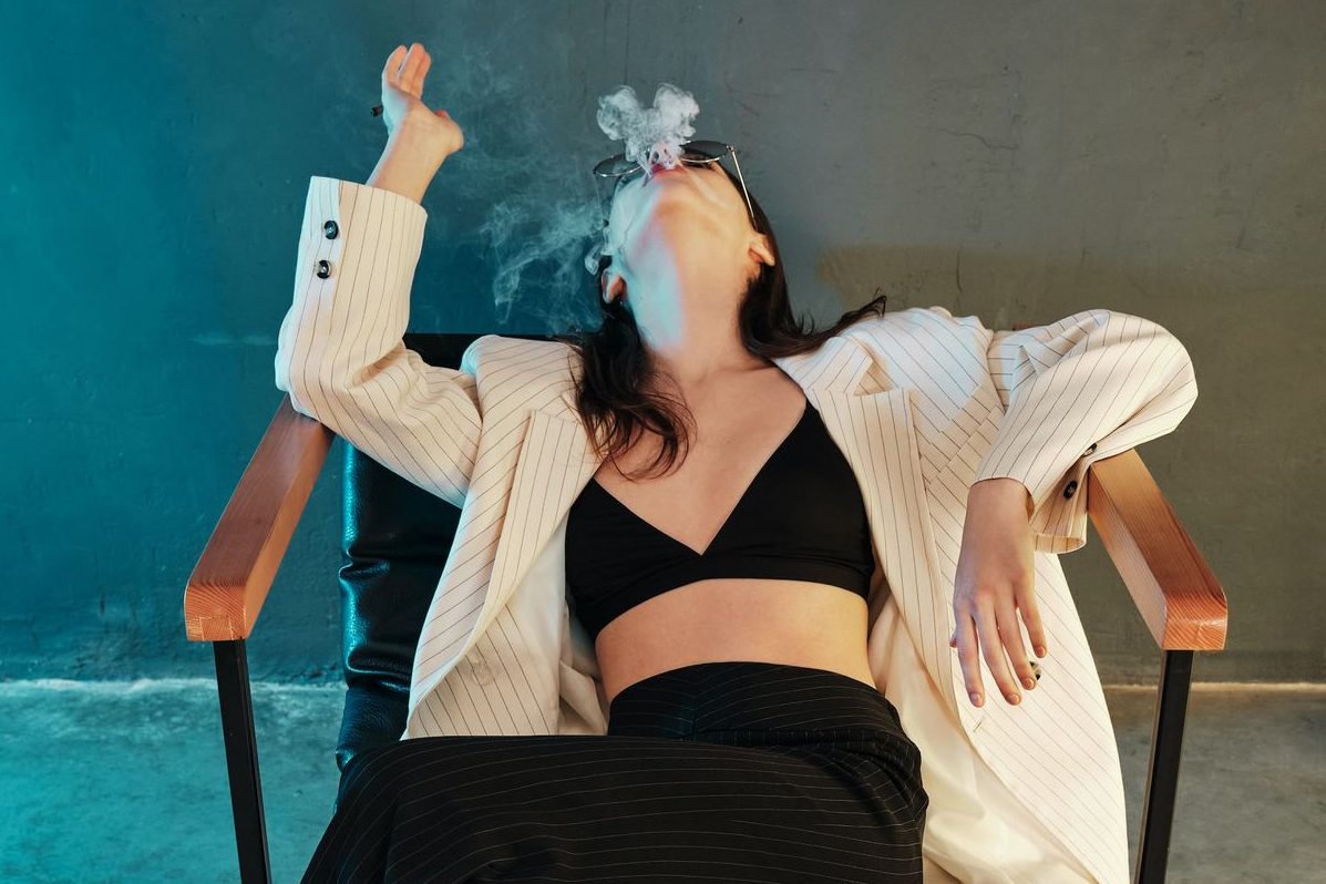 woman smoking cannabis vape